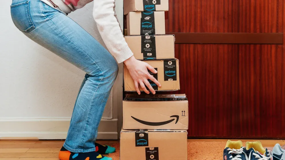 woman-lifting-amazon-packages